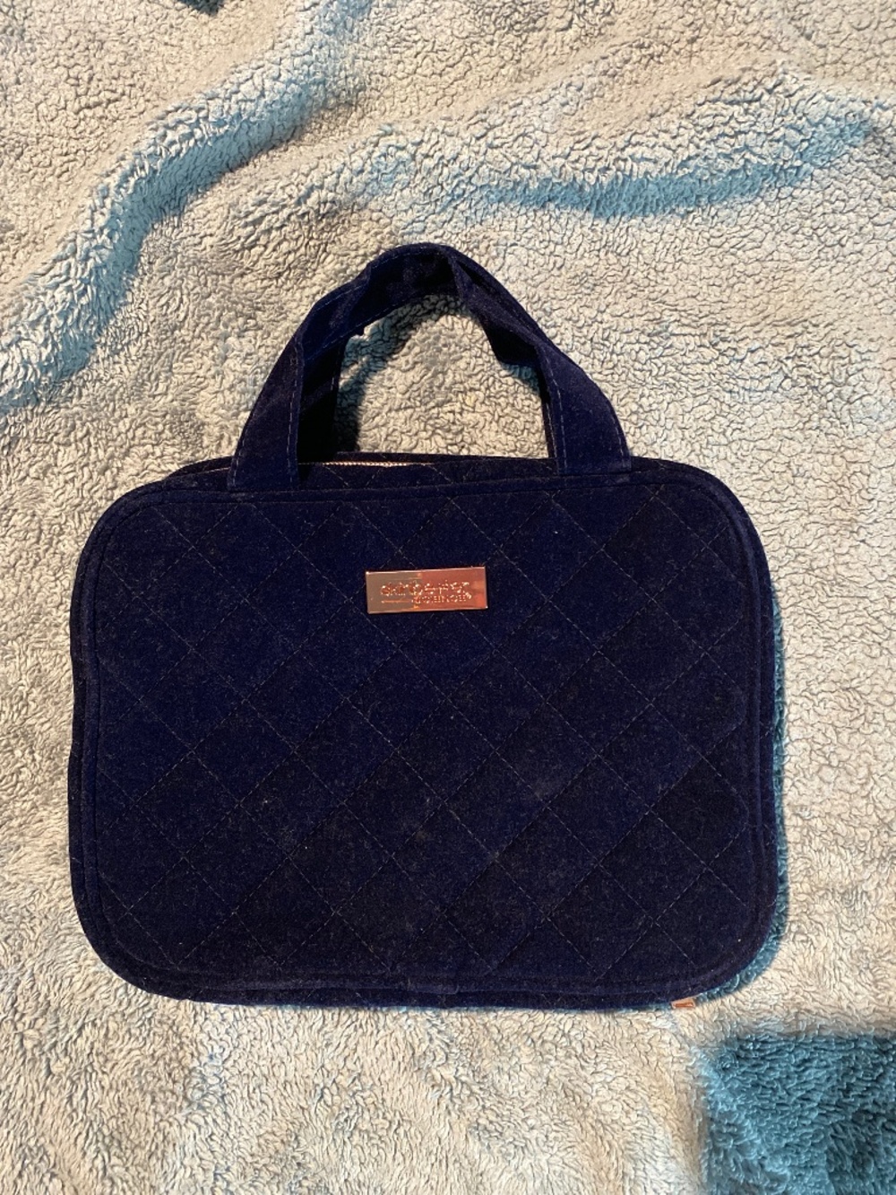Skinbetter Science velvet blue travel pouch